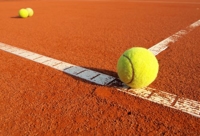 Why play tennis on a clay court?
