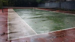 A rained on tennis court